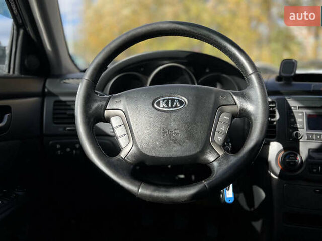 Чорний Кіа Маджентіс, об'ємом двигуна 2 л та пробігом 174 тис. км за 4800 $, фото 8 на Automoto.ua