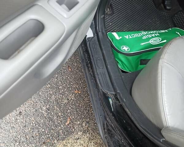 Черный Киа Маджентис, объемом двигателя 2 л и пробегом 226 тыс. км за 5500 $, фото 11 на Automoto.ua