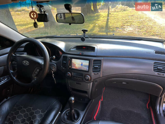 Черный Киа Маджентис, объемом двигателя 2 л и пробегом 227 тыс. км за 5800 $, фото 21 на Automoto.ua