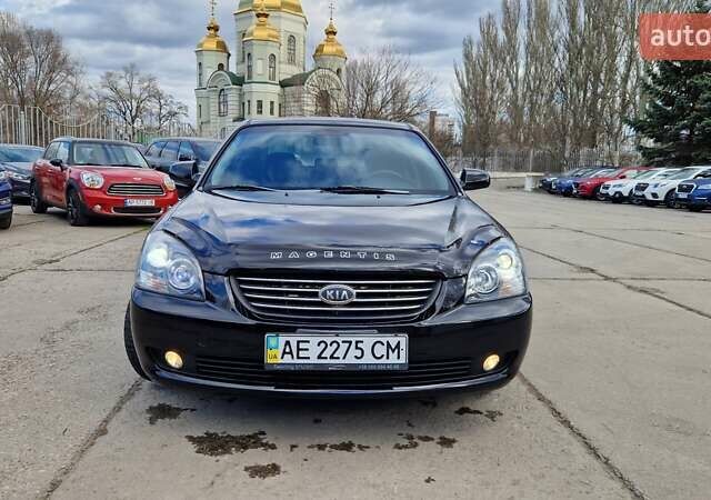 Чорний Кіа Маджентіс, об'ємом двигуна 2 л та пробігом 335 тис. км за 6500 $, фото 1 на Automoto.ua
