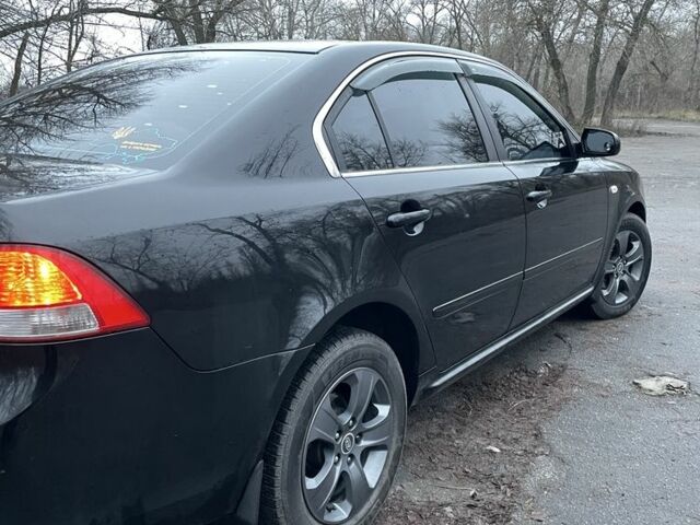 Черный Киа Маджентис, объемом двигателя 2 л и пробегом 222 тыс. км за 7200 $, фото 4 на Automoto.ua