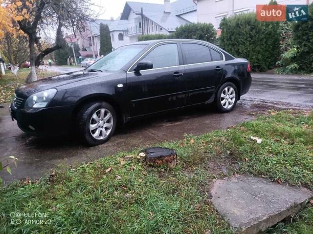 Чорний Кіа Маджентіс, об'ємом двигуна 2 л та пробігом 100 тис. км за 4800 $, фото 5 на Automoto.ua