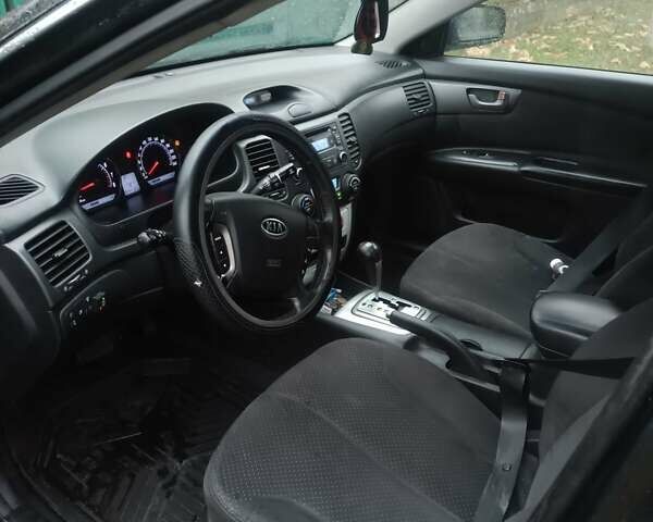 Чорний Кіа Маджентіс, об'ємом двигуна 2 л та пробігом 100 тис. км за 4800 $, фото 4 на Automoto.ua