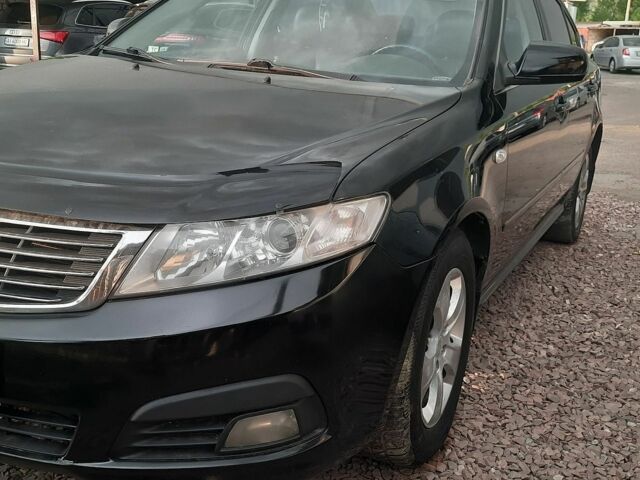 Чорний Кіа Маджентіс, об'ємом двигуна 2 л та пробігом 275 тис. км за 4650 $, фото 3 на Automoto.ua