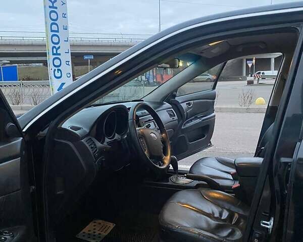 Черный Киа Маджентис, объемом двигателя 2 л и пробегом 208 тыс. км за 6400 $, фото 23 на Automoto.ua