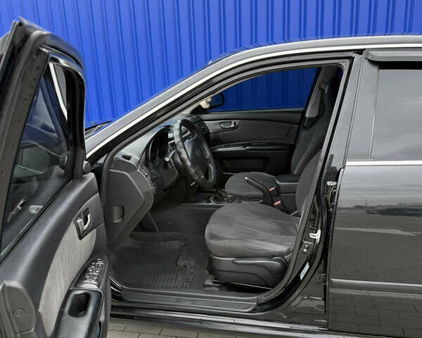 Чорний Кіа Маджентіс, об'ємом двигуна 2 л та пробігом 170 тис. км за 6300 $, фото 9 на Automoto.ua