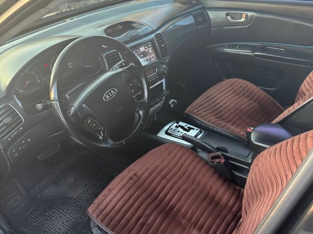 Черный Киа Маджентис, объемом двигателя 2 л и пробегом 317 тыс. км за 5200 $, фото 8 на Automoto.ua