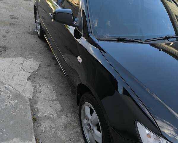 Черный Киа Маджентис, объемом двигателя 2 л и пробегом 263 тыс. км за 6500 $, фото 4 на Automoto.ua