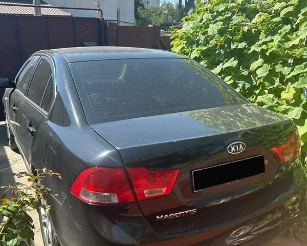 Чорний Кіа Маджентіс, об'ємом двигуна 2 л та пробігом 230 тис. км за 5300 $, фото 2 на Automoto.ua