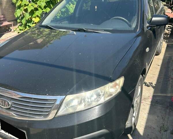 Чорний Кіа Маджентіс, об'ємом двигуна 2 л та пробігом 230 тис. км за 5300 $, фото 1 на Automoto.ua