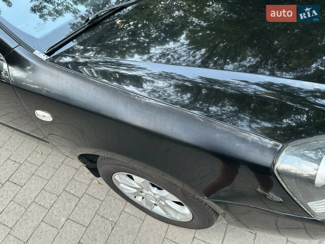 Черный Киа Маджентис, объемом двигателя 2 л и пробегом 362 тыс. км за 4300 $, фото 8 на Automoto.ua