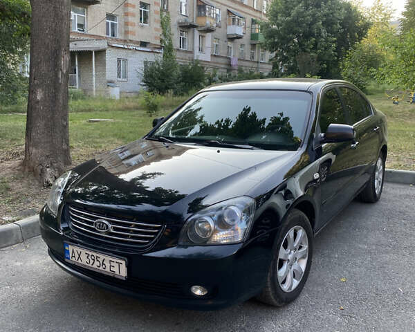 Чорний Кіа Маджентіс, об'ємом двигуна 2 л та пробігом 300 тис. км за 4550 $, фото 3 на Automoto.ua