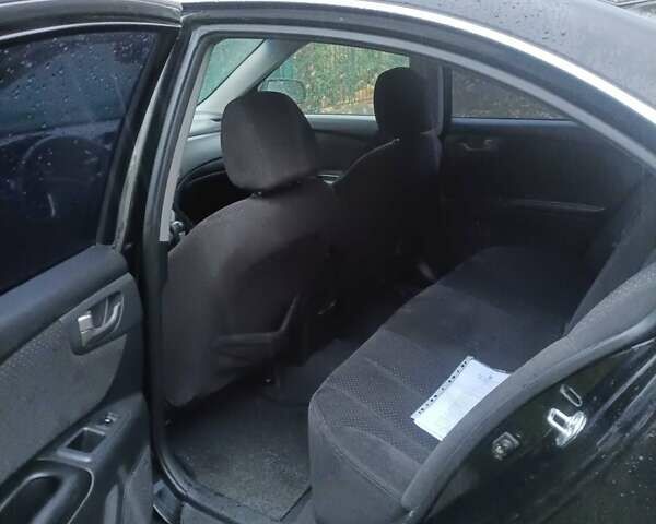 Чорний Кіа Маджентіс, об'ємом двигуна 2 л та пробігом 100 тис. км за 4800 $, фото 3 на Automoto.ua