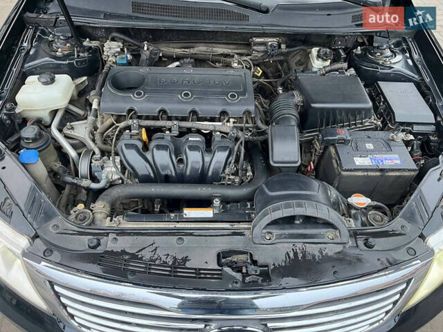 Чорний Кіа Маджентіс, об'ємом двигуна 2 л та пробігом 250 тис. км за 6999 $, фото 14 на Automoto.ua