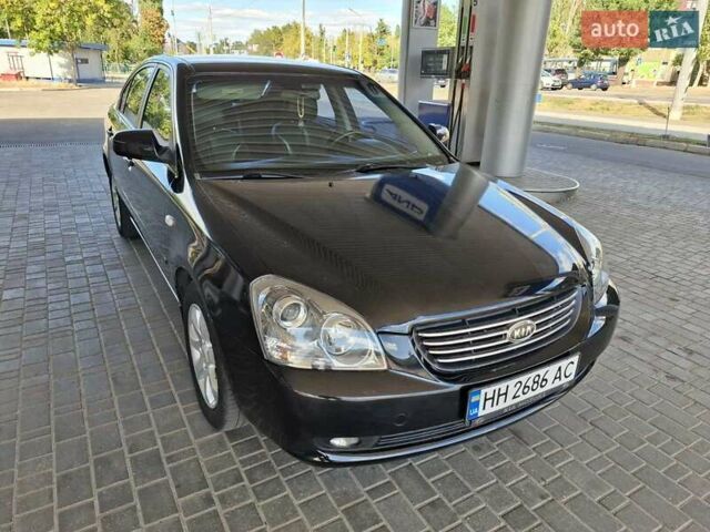 Чорний Кіа Маджентіс, об'ємом двигуна 2 л та пробігом 192 тис. км за 6600 $, фото 3 на Automoto.ua