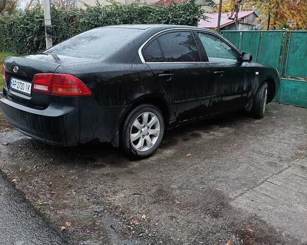 Чорний Кіа Маджентіс, об'ємом двигуна 2 л та пробігом 100 тис. км за 4800 $, фото 7 на Automoto.ua