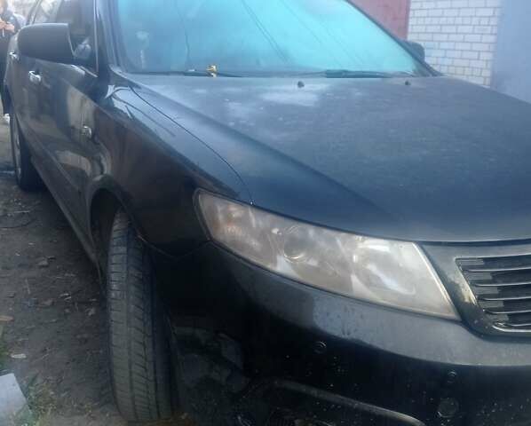 Чорний Кіа Маджентіс, об'ємом двигуна 2 л та пробігом 247 тис. км за 4900 $, фото 8 на Automoto.ua