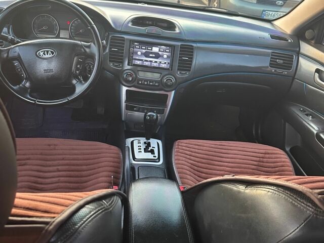 Черный Киа Маджентис, объемом двигателя 2 л и пробегом 317 тыс. км за 5200 $, фото 4 на Automoto.ua