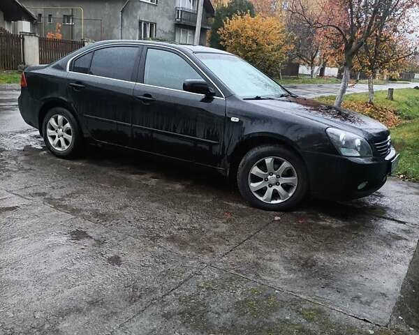 Чорний Кіа Маджентіс, об'ємом двигуна 2 л та пробігом 100 тис. км за 4800 $, фото 8 на Automoto.ua
