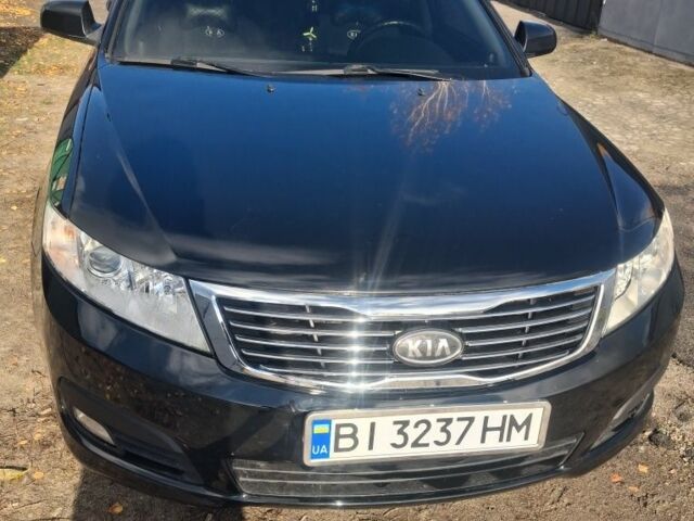 Чорний Кіа Маджентіс, об'ємом двигуна 2 л та пробігом 222 тис. км за 6500 $, фото 2 на Automoto.ua