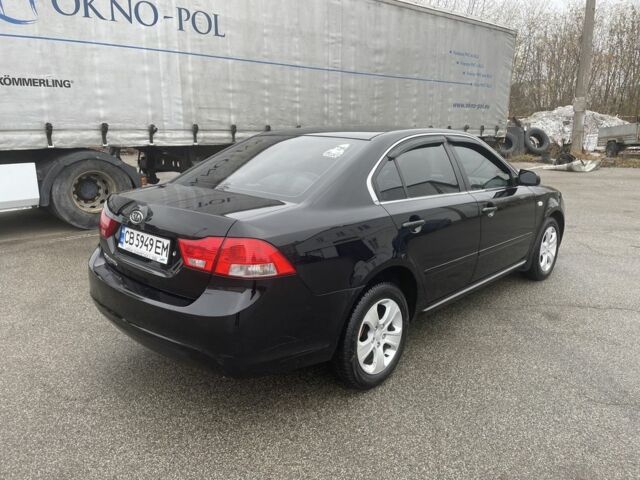 Чорний Кіа Маджентіс, об'ємом двигуна 2 л та пробігом 213 тис. км за 6700 $, фото 4 на Automoto.ua