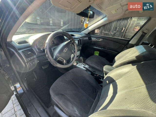 Черный Киа Маджентис, объемом двигателя 2 л и пробегом 195 тыс. км за 5559 $, фото 4 на Automoto.ua