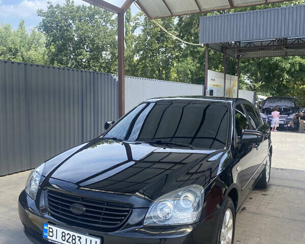 Черный Киа Маджентис, объемом двигателя 2 л и пробегом 275 тыс. км за 6699 $, фото 1 на Automoto.ua