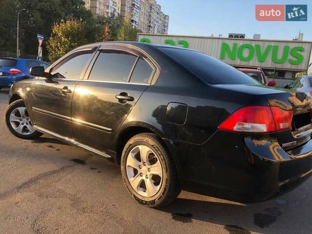 Чорний Кіа Маджентіс, об'ємом двигуна 2 л та пробігом 356 тис. км за 6000 $, фото 23 на Automoto.ua