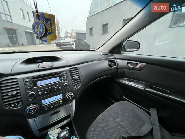 Черный Киа Маджентис, объемом двигателя 2.66 л и пробегом 254 тыс. км за 4300 $, фото 13 на Automoto.ua