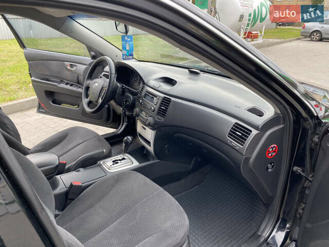 Черный Киа Маджентис, объемом двигателя 2 л и пробегом 239 тыс. км за 5200 $, фото 10 на Automoto.ua