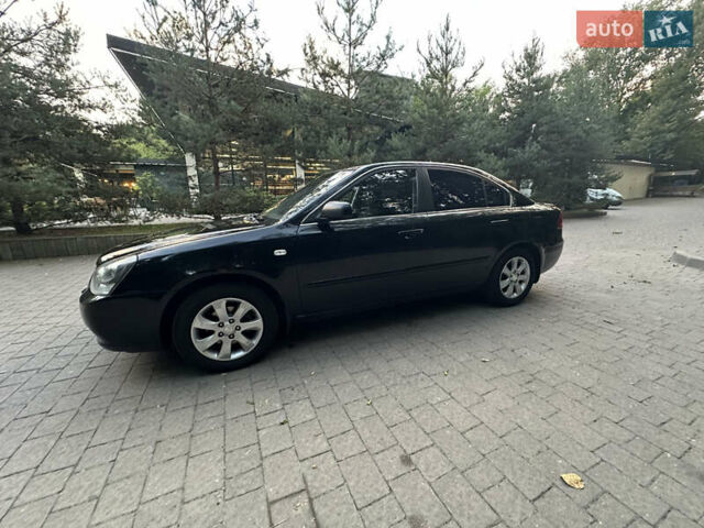 Черный Киа Маджентис, объемом двигателя 2 л и пробегом 362 тыс. км за 4300 $, фото 2 на Automoto.ua