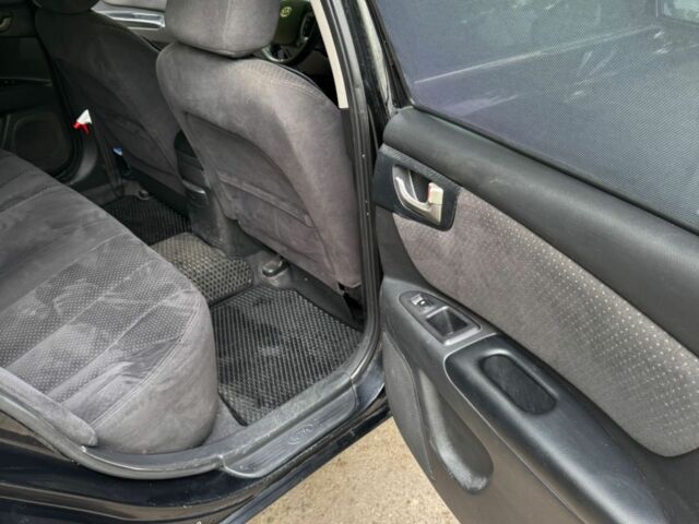 Черный Киа Маджентис, объемом двигателя 2 л и пробегом 300 тыс. км за 4501 $, фото 4 на Automoto.ua