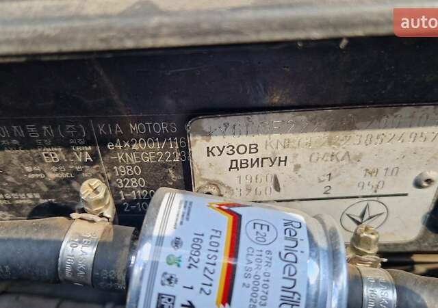 Чорний Кіа Маджентіс, об'ємом двигуна 2 л та пробігом 335 тис. км за 6500 $, фото 30 на Automoto.ua