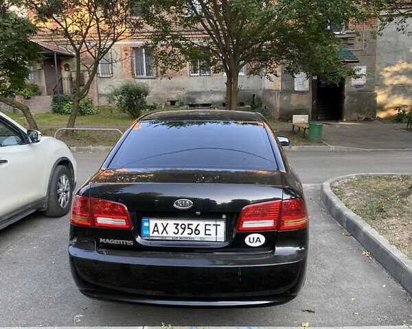 Чорний Кіа Маджентіс, об'ємом двигуна 2 л та пробігом 300 тис. км за 4550 $, фото 4 на Automoto.ua