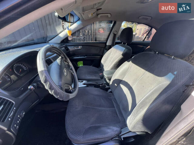 Черный Киа Маджентис, объемом двигателя 2 л и пробегом 195 тыс. км за 5559 $, фото 3 на Automoto.ua
