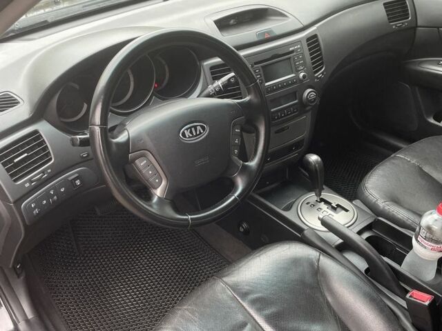 Чорний Кіа Маджентіс, об'ємом двигуна 2 л та пробігом 213 тис. км за 6700 $, фото 8 на Automoto.ua