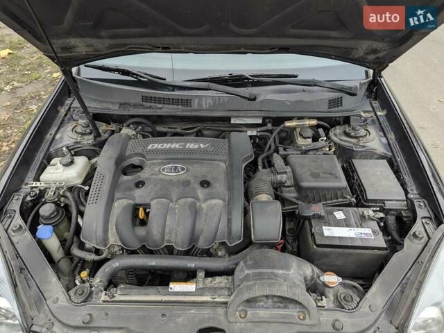 Черный Киа Маджентис, объемом двигателя 2 л и пробегом 236 тыс. км за 6000 $, фото 11 на Automoto.ua