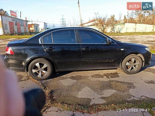 Черный Киа Маджентис, объемом двигателя 2 л и пробегом 226 тыс. км за 5500 $, фото 16 на Automoto.ua