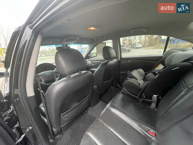 Чорний Кіа Маджентіс, об'ємом двигуна 2 л та пробігом 213 тис. км за 6700 $, фото 12 на Automoto.ua