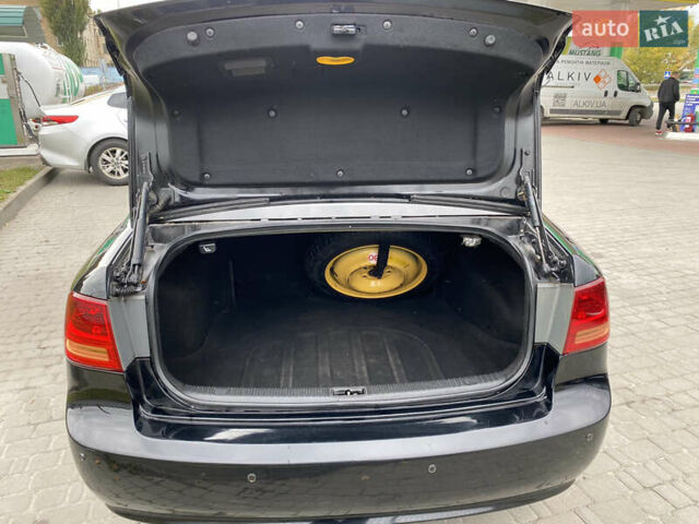 Черный Киа Маджентис, объемом двигателя 2 л и пробегом 239 тыс. км за 5200 $, фото 12 на Automoto.ua