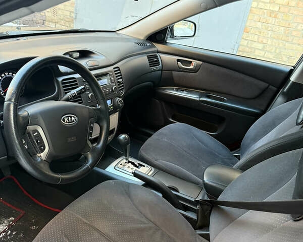 Черный Киа Маджентис, объемом двигателя 2.66 л и пробегом 250 тыс. км за 4850 $, фото 2 на Automoto.ua