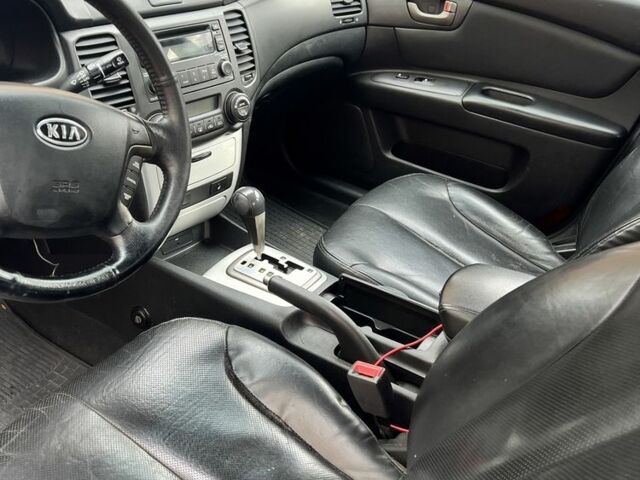 Черный Киа Маджентис, объемом двигателя 2.7 л и пробегом 280 тыс. км за 4600 $, фото 4 на Automoto.ua