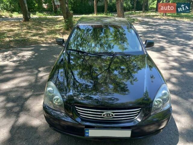 Черный Киа Маджентис, объемом двигателя 2 л и пробегом 190 тыс. км за 6500 $, фото 2 на Automoto.ua