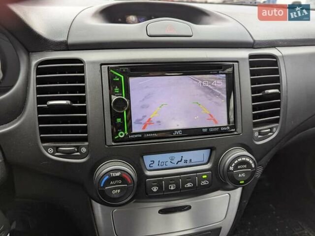 Черный Киа Маджентис, объемом двигателя 2 л и пробегом 236 тыс. км за 6000 $, фото 12 на Automoto.ua