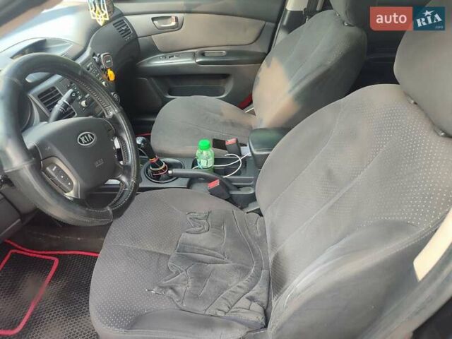 Черный Киа Маджентис, объемом двигателя 2 л и пробегом 257 тыс. км за 6500 $, фото 5 на Automoto.ua