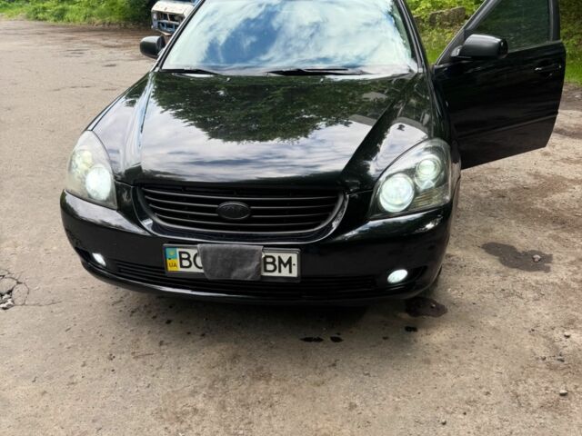 Черный Киа Маджентис, объемом двигателя 2 л и пробегом 300 тыс. км за 4501 $, фото 11 на Automoto.ua