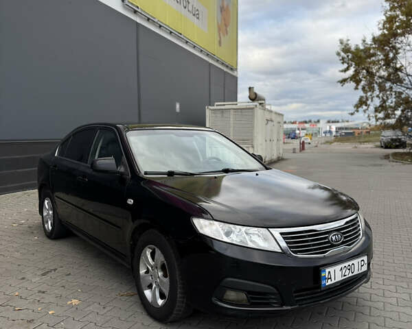 Черный Киа Маджентис, объемом двигателя 2 л и пробегом 350 тыс. км за 4650 $, фото 1 на Automoto.ua