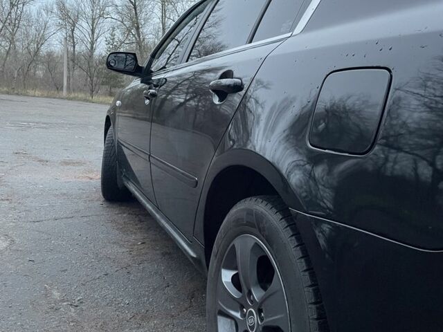 Черный Киа Маджентис, объемом двигателя 2 л и пробегом 222 тыс. км за 7200 $, фото 2 на Automoto.ua