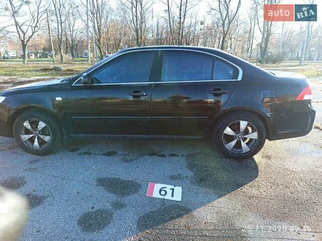 Черный Киа Маджентис, объемом двигателя 2 л и пробегом 226 тыс. км за 5500 $, фото 14 на Automoto.ua