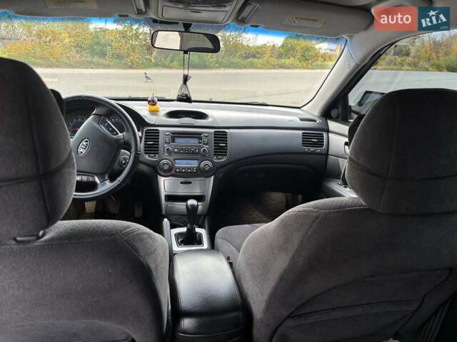 Чорний Кіа Маджентіс, об'ємом двигуна 2 л та пробігом 244 тис. км за 5200 $, фото 22 на Automoto.ua